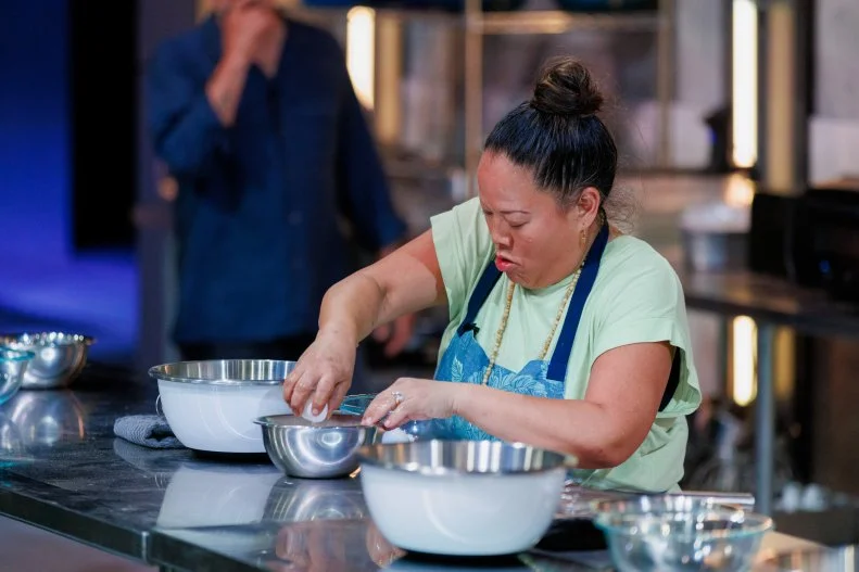 Contestant Lee Anne Wong moves on to the next station, as seen on 24 in 24: Last Chef Standing, Season 3.