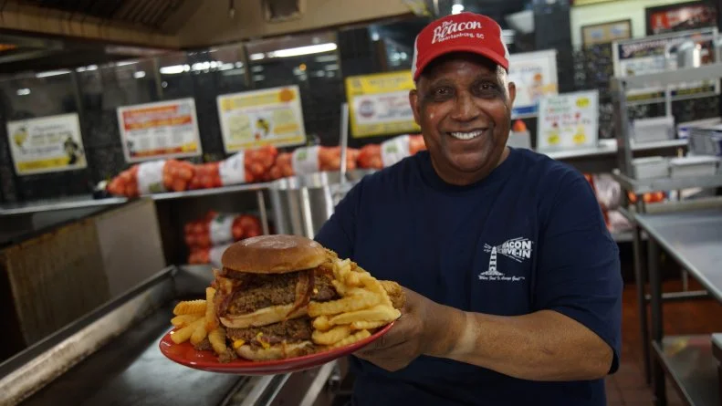 Chef with the Bacon Double Cheeseburger Aplenty at The Beacon Drive In.