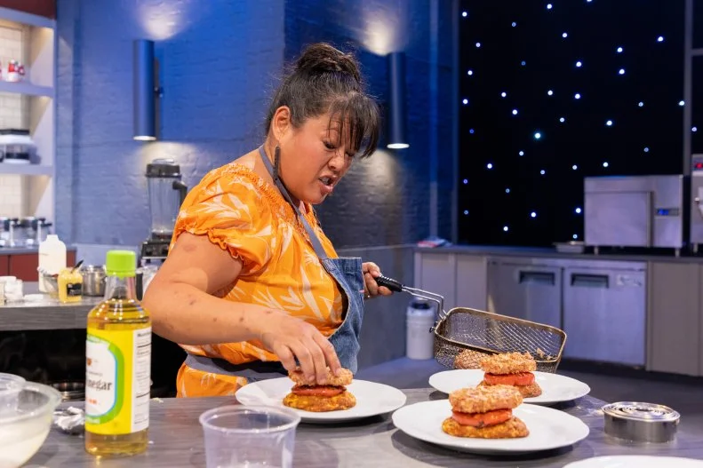Contestant Lee Anne Wong, cooking process, as seen on Alex vs America, Season 3.