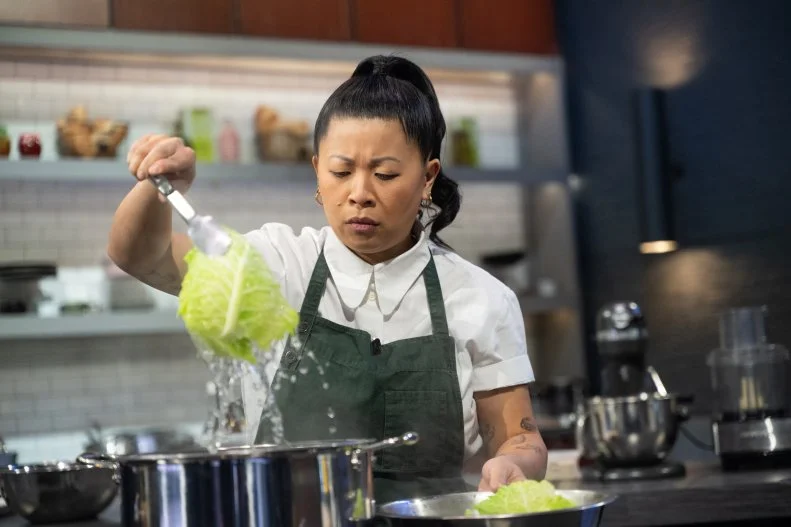 Contestant Mei Lin, during round 1 of cooking, as seen on Alex vs America, Season 5.