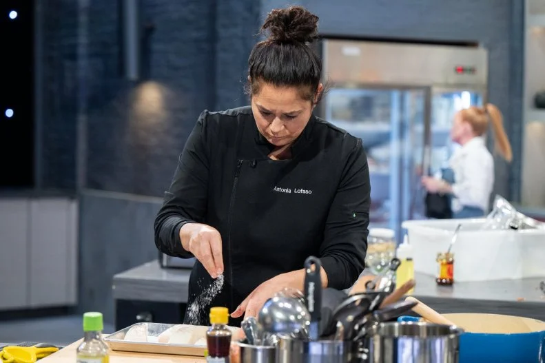 Contestant Antonia Lofaso, during round 1 of cooking, as seen on Alex vs America, Season 5.