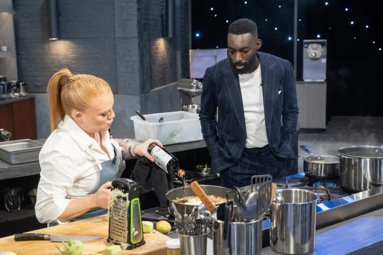 Host Eric Adjepong visits the station of Tiffani Faison, as seen on Alex vs America, Season 5.