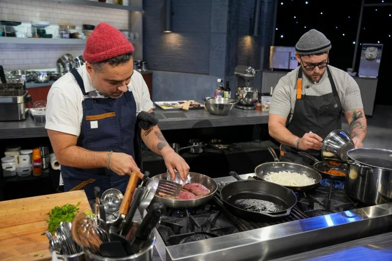 Chefs David Vivana and Brian Lopes cooking (L to R), as seen on Alex Vs. America, Season 5.