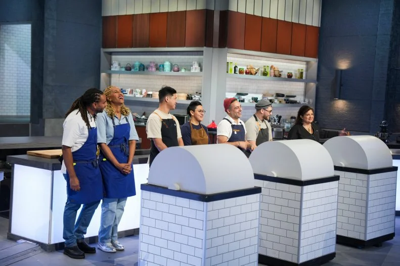 Chefs Michael Reed, Kwini Reed, Kevin Tien, Paola Serrano, David Viana, Brian Lopes and Alex Guaranschelli (L to R), as seen on Alex Vs. America, Season 5.