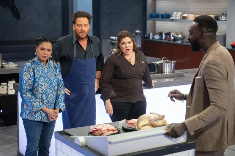 Contestants Maneet Chauhan, Scott Conant, Chef Alex Guarnaschelli and Host Eric Adjepong, react to seeing the same ingredients as round one, as seen on Alex vs America, Season 5.