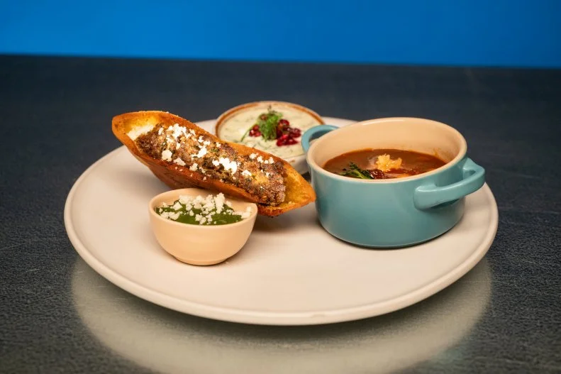 Round 2 dish by Maneet Chauhan, featuring lamb shoulder, dandelion greens, fortune cookies and root beer schnapps, as seen on Alex vs America, Season 5.