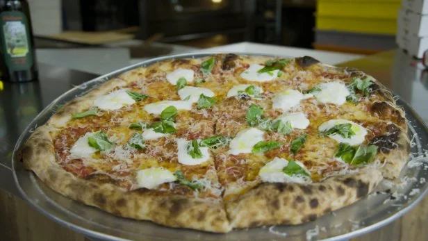 Beauty shot of L'Industrie Pizeria's Burrata Pie.  No Talent in the still.