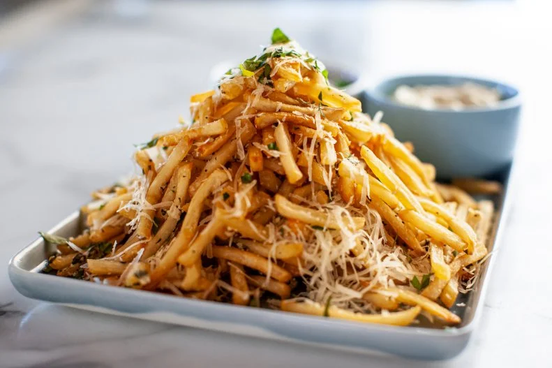 Close-up of Parmesan Garlic Fries, as seen on The Pioneer Woman, season 33.