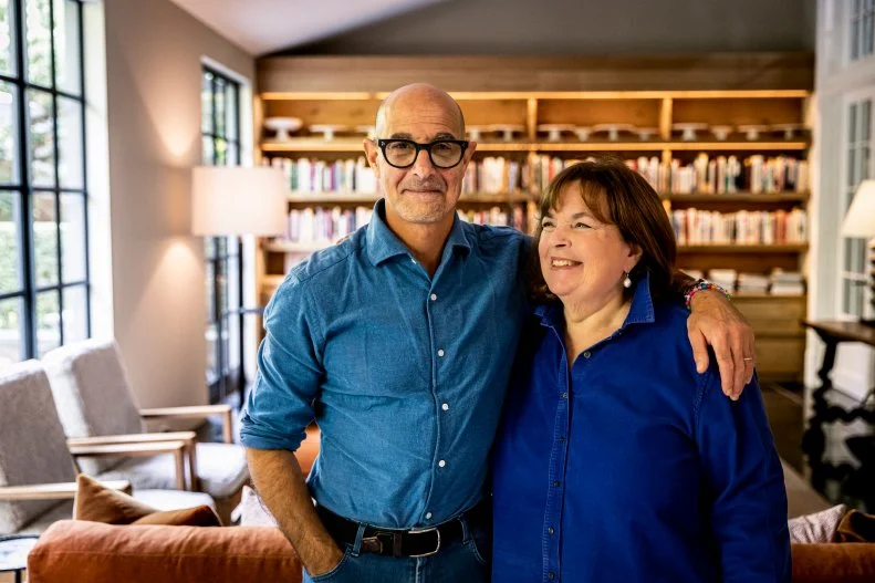 Ina Garten poses with Stanley Tucci, as seen on Be My Guest with Ina Garten, season 3.