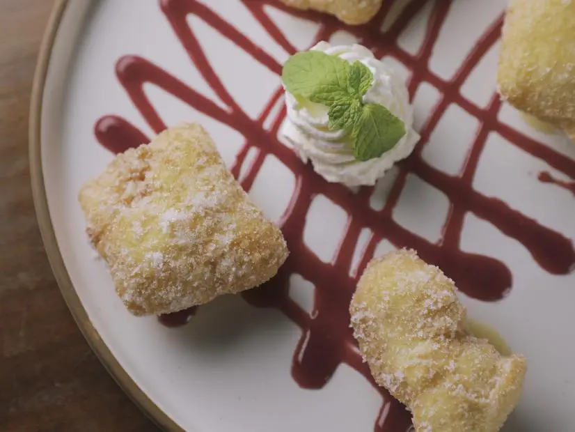 Beignets as prepared by Chef Matt Broihahn at The 239 Naples in Naples, Florida, as seen on Food Network's Diners Drive-Ins and Dives, season 41.