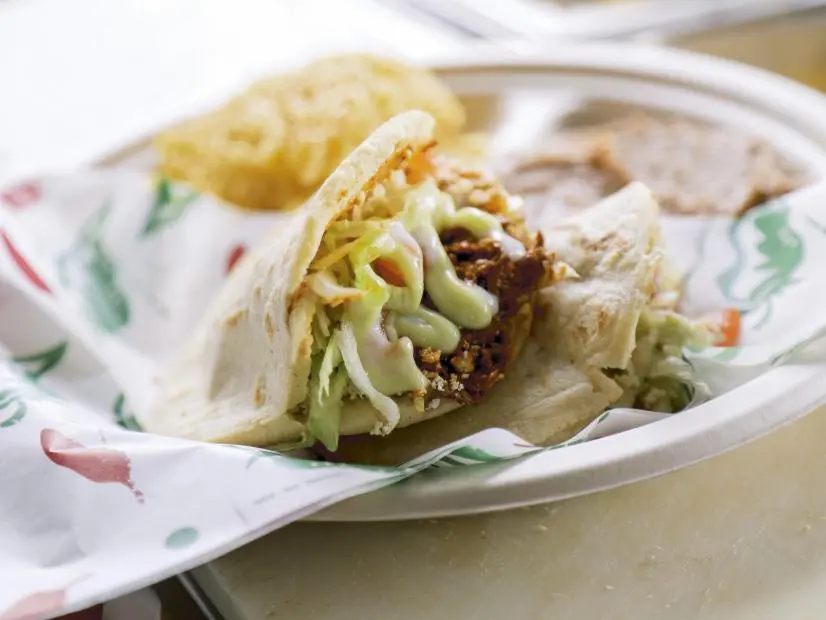 Gorditas Plate as prepared by Lily and Aaron Arias at El Palote Panaderia in Dallas, Texas as seen on Food Network's Diners Drive-Ins and Dives, Season 41.