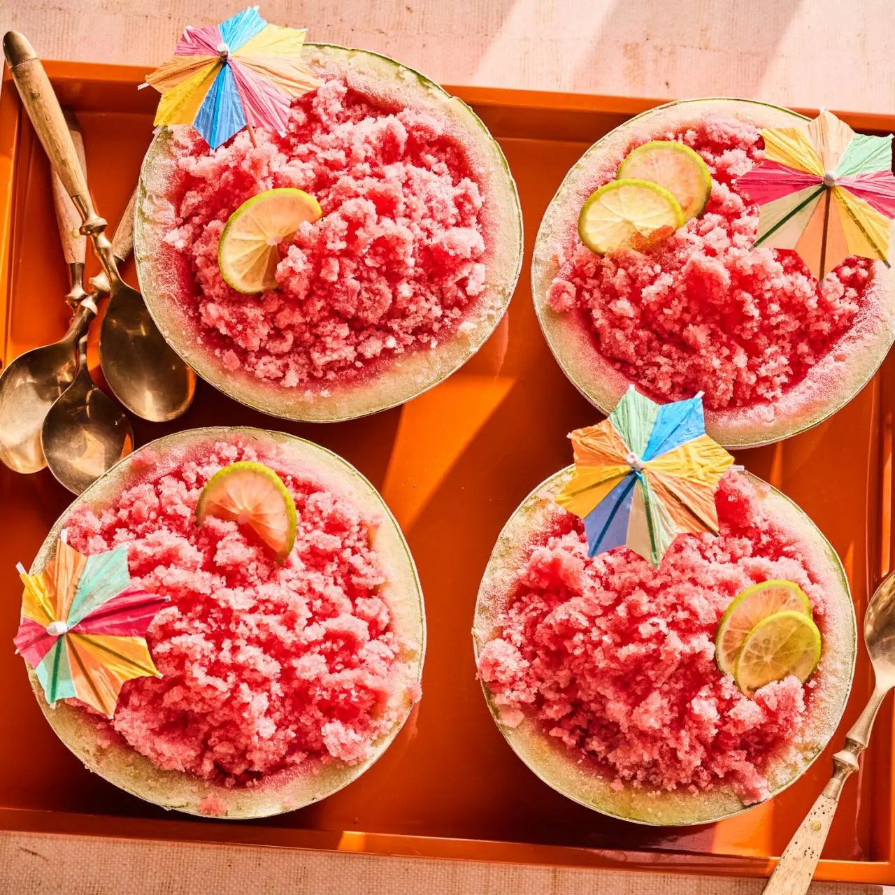 Fluffy Watermelon Margarita Granita in Hollowed Bowls