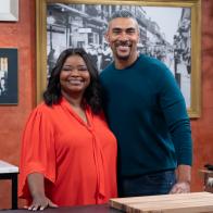 Dook Chase and Octavia Spencer pose for the camera together inside at one of the cook stations