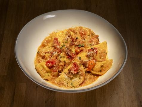 Goat Cheese and Spinach Mezzelune with Guanciale and Fresh Cherry Tomato Sauce