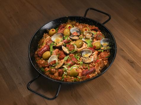 Paella with Chicken, Chorizo, Merguez Sausage and Clams with Roasted Garlic, Saffron and Lemon Aïoli