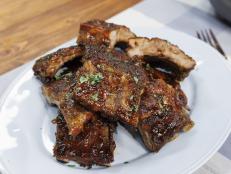 We love ribs at the Biegel house. My husband, Ryan, taught me this method of wrapping the ribs tightly in foil and starting them at a high heat before lowering the temperature for low and slow cooking. The peach preserves and jalape&ntilde;o are the perfect combo of salty, sweet and spicy.