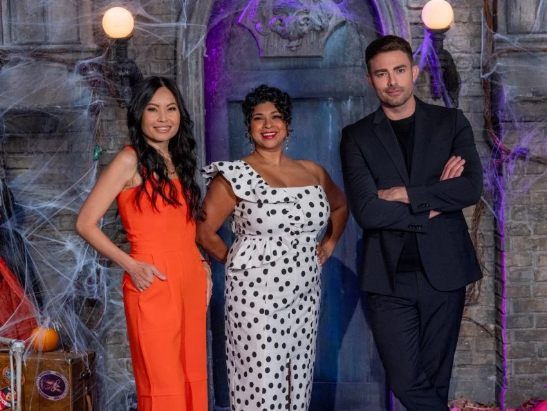 Host Jonathan Bennett and Judges Shinmin Li and Aarti Sequeira during the “Scare School" challenge, as seen on Halloween Wars, Season 15.