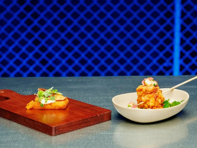 Contestant Gabe Bertaccini beauty of dish - N’duja fried polenta with mushroom ragout Skewer - Fried hot chicken with rhubarb relish, as seen on Chef Grudge Match, Season 1.
