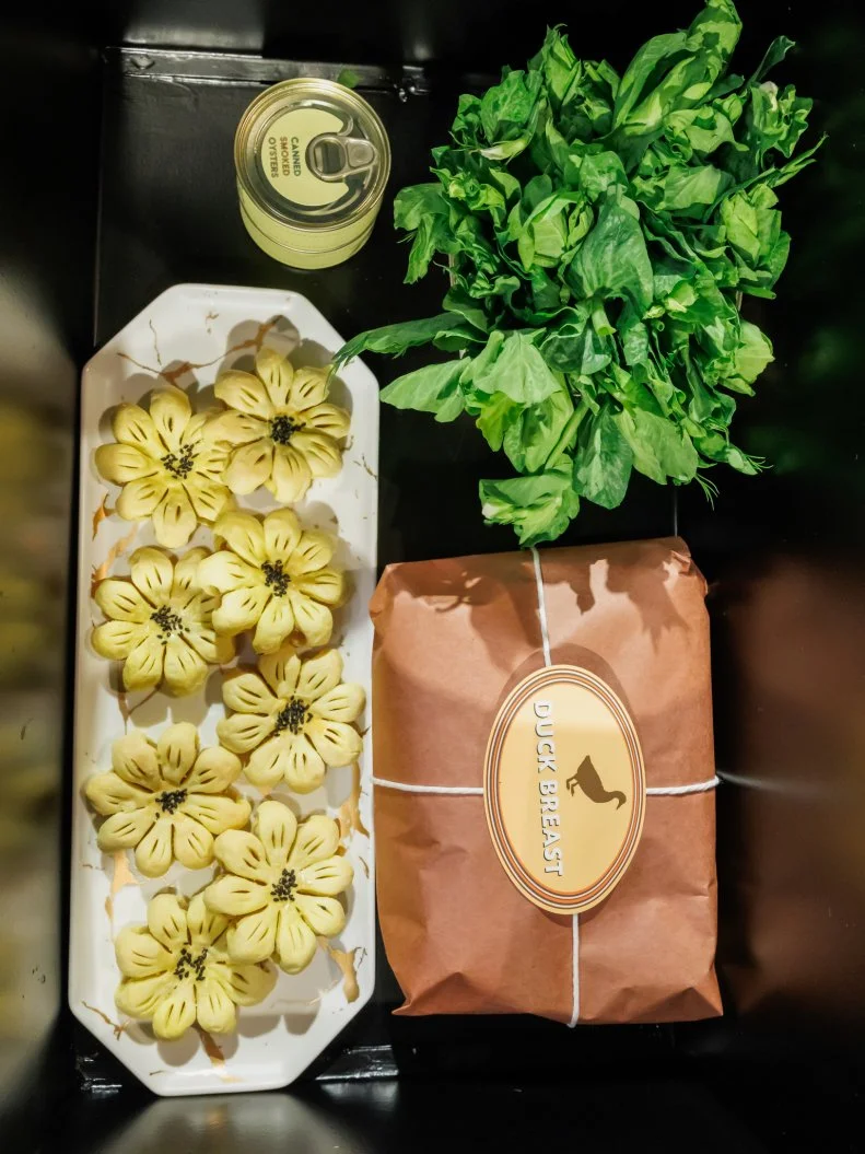 Round 2 basket ingredients: Pineapple Moon Cake, Pea Greens, Duck Breast, Canned Smoked Oysters
