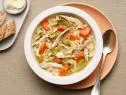 Food Network Kitchen’s Rotisserie Chicken Noodle Soup, as seen on Food Network.
