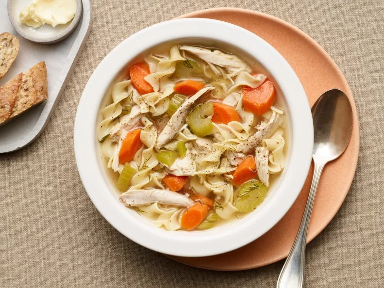 Food Network Kitchen’s Rotisserie Chicken Noodle Soup, as seen on Food Network.