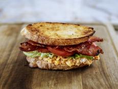 Whenever Ree has to run to town or to the big city she likes to take her favorite BLT sandwich. Sometimes, she&rsquo;ll switch things up a level, first by adding pimiento cheese, then by adding some extra special ingredients when she cooks the bacon.