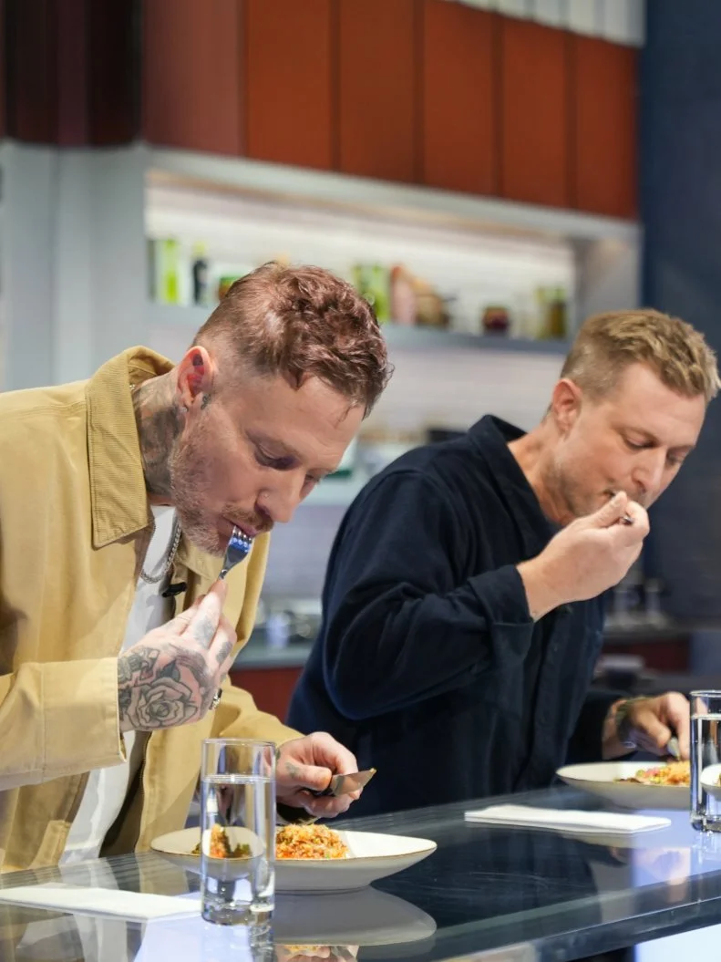 Judges Michael Voltaggio and Bryan Voltaggio (L to R) tasting, as seen on Alex Vs. America, Season 5.