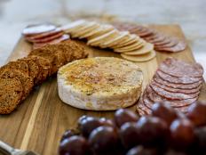 This dish is mashup between baked Brie and cr&egrave;me br&ucirc;l&eacute;e, complete with a crispy sugar topping. It makes a wonderful appetizer or starter for before a meal.