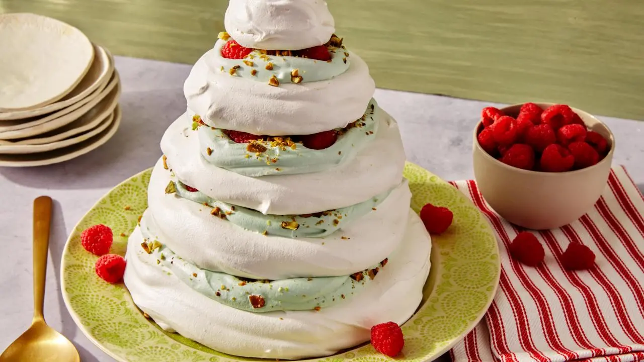 Christmas Tree Pavlova with Pistachio Cream and Raspberries