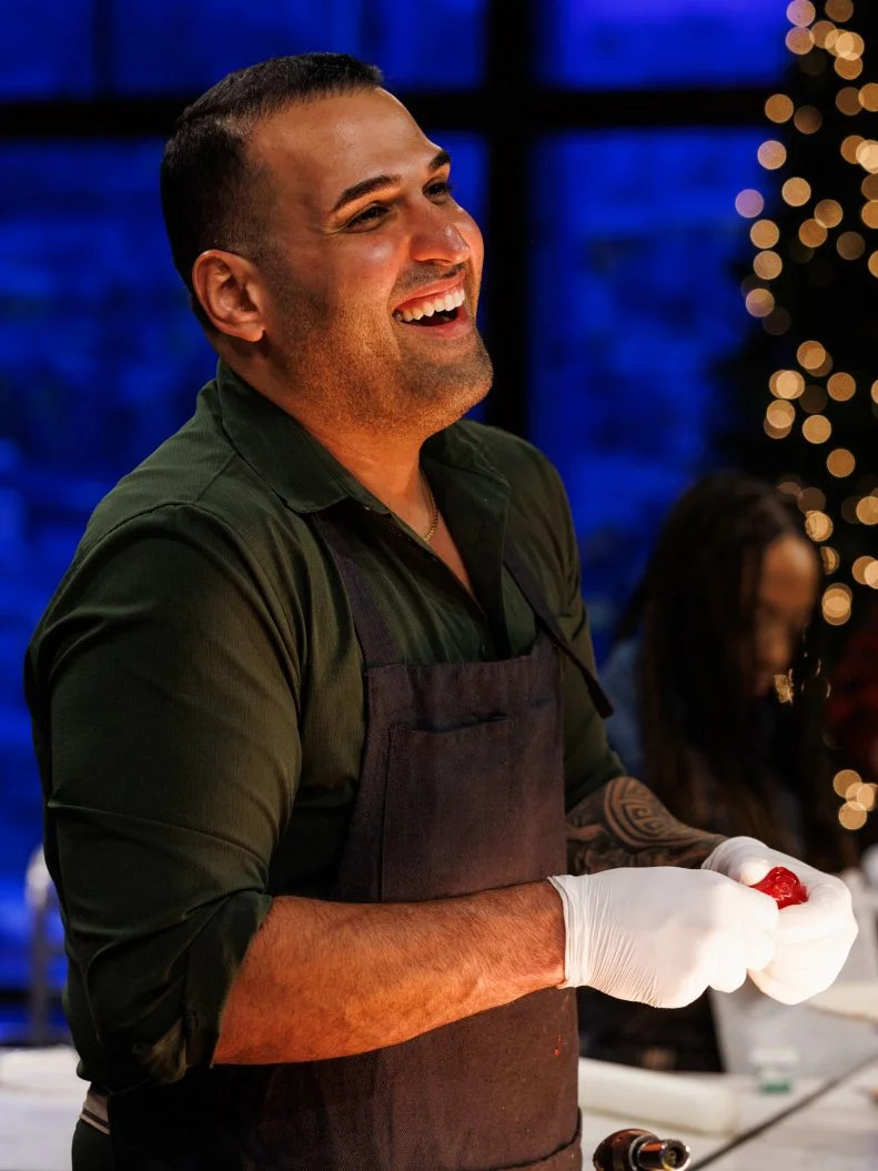 Contestant Jonathan Elias prepares his dish for challenge 1, as seen on Sweet Empire, Season 1