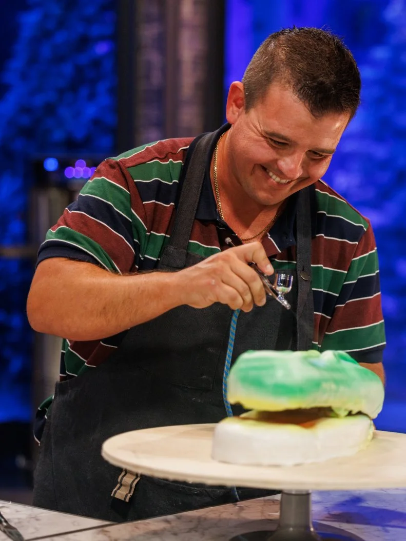 Contestant Nils Rowland prepares his challenge 1 dish, as seen on Sweet Empire, Season 1