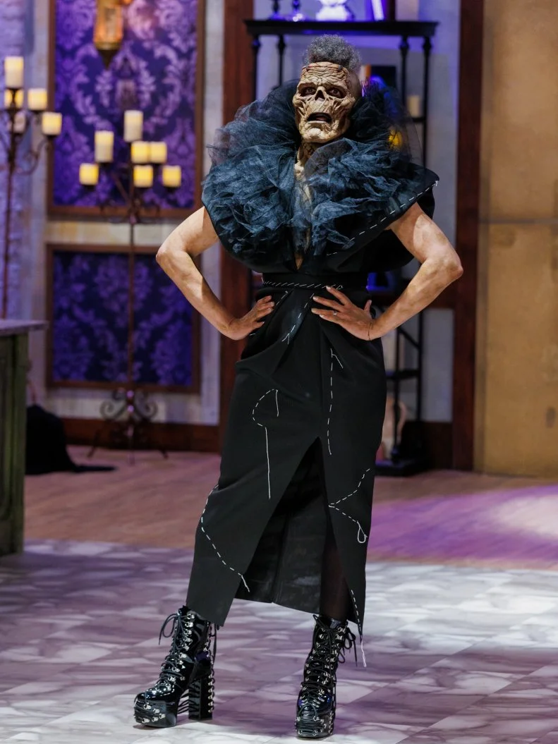 Judge Carla Hall enters, as seen on Halloween Baking Championship, Season 11.
