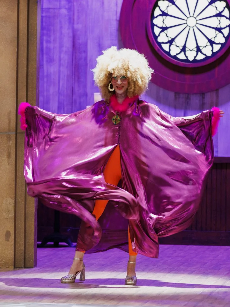 Judge Carla Hall enters, as seen on Halloween Baking Championship, Season 11.