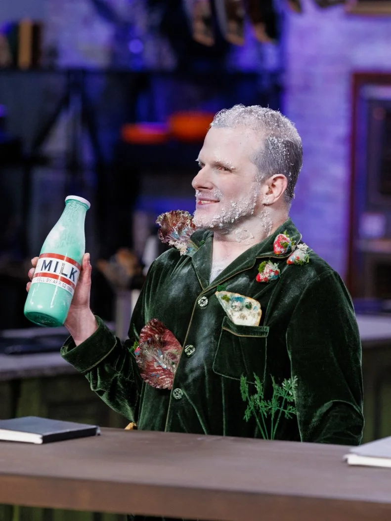 Judge Zac Young enters, as seen on Halloween Baking Championship, Season 11.