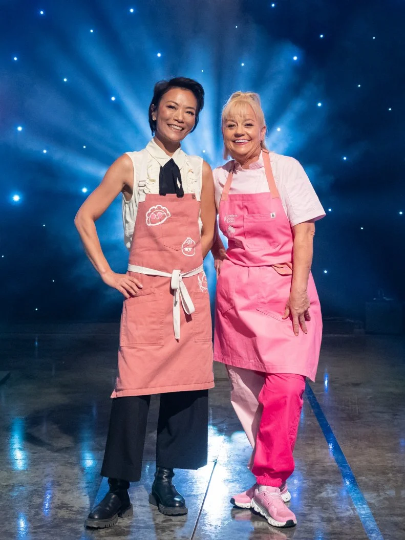 Contestants Shirley Chung and Sherry Yard pose on set, as seen on Tournament of Champions Holiday, Season 1.