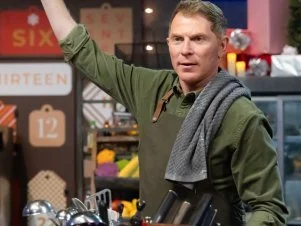 Host Bobby Flay prepares signature dish, as seen on Beat Bobby Flay, Hoiliday Throwdown Season 4