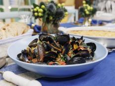 This fiery seafood can be served as an appetizer or as a main dish. It's a great addition to any holiday spread. Just make sure to serve with toasted crusty bread for soaking up all the flavors.
