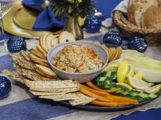 I didn't grow up with whitefish dip, but as soon as I moved to in NYC in 2001, I started shopping at a music store that used to be just a few doors down from the iconic Russ & Daughters Delicatessen. I went in for a childhood favorite of pickled herring and fell in love with all the fish dips offered. Whitefish dips are my favorite, but this is equally delicious using canned, smoked salmon or smoked cod. Also, feel free to leave out the serrano, but it truly matches well with the smoky fish, and just one won't hurt. I've made a sandwich out of this before with toast and plenty of thin cucumber slices or tomatoes from the garden, but it's great shared with dippables like bagel chips or artisan crackers.