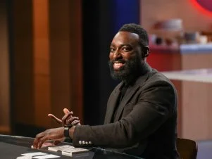 Host Eric Adjepong setting up , as seen on the Food Network's Guy's Grocery Games.