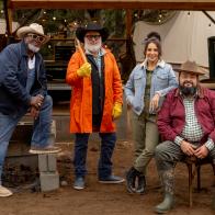 Host Andrew Zimmern with Judges Moe Casen, Ernest Servantes and Jess Pryles during the  Big Burn: The Core Four Cook-Off challenge as seen on Pit Masters, Season 1.