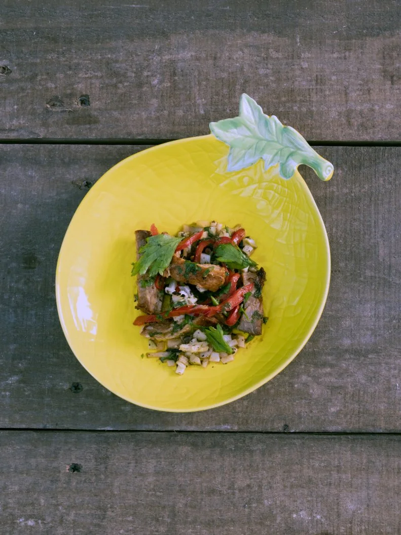 Purple Team's round one dish: Roasted Pork Belly Salad, as seen on Chopped Castaways: Season 1