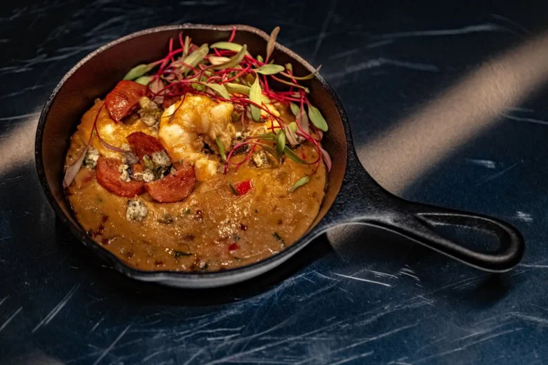 Contestant Johnnie Gale's round 1 dish "Prawn Head Etouffee with smoked oyster andouille crumble", as seen on Alex vs America, Season 1.