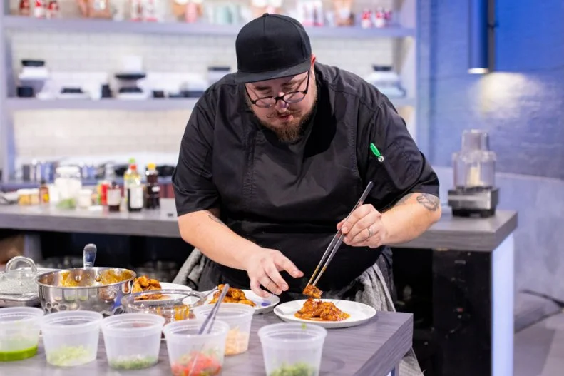 Contestant Loren Rue, cooking process, as seen on Alex vs America, Season 3.