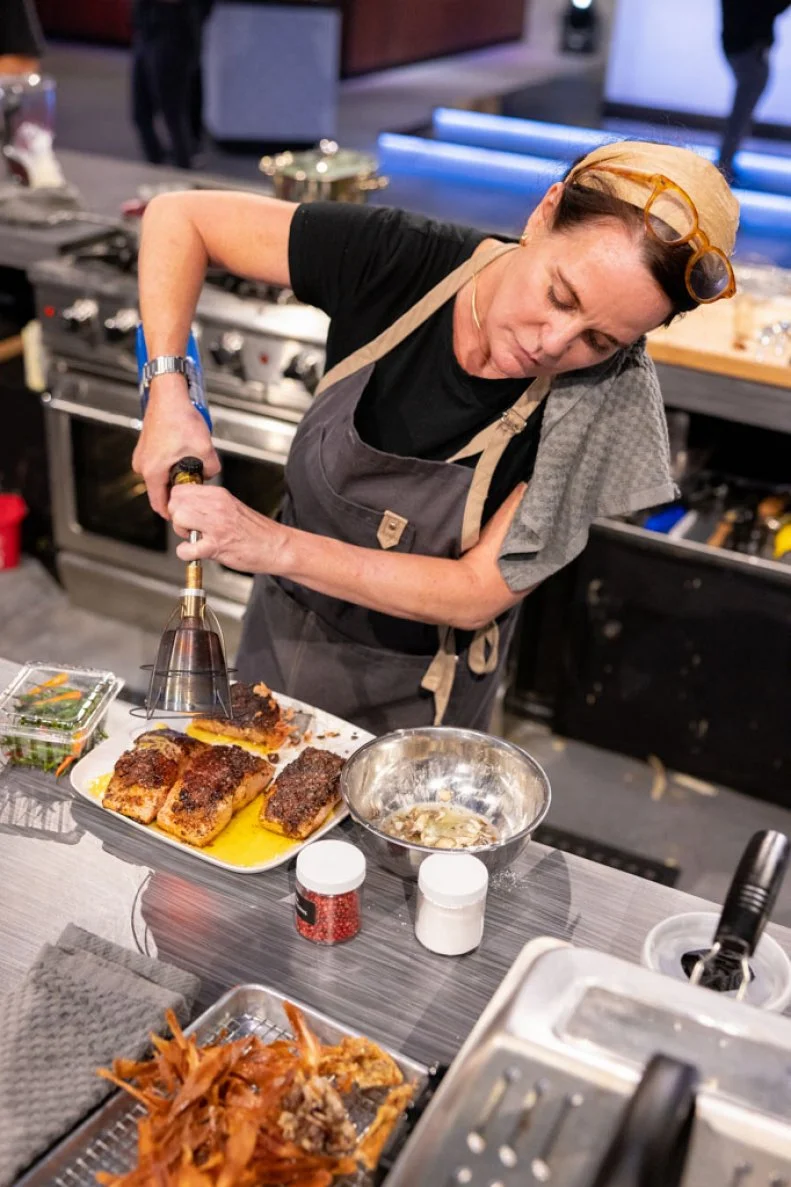 Contestant Laura Cole, cooking process, as seen on Alex vs America, Season 3.