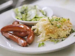 Jansson's Temptation as prepared by Chef/Owner Patty Rasmussen at Tre Kronor in Chicago, Illinois, as seen on Food Network's Triple D Nation, season 8.