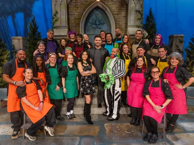 Host Jonathan Bennett with judges Shinmin Li and Andrew Fuller with competitors as seen on Halloween Wars, Season 16.