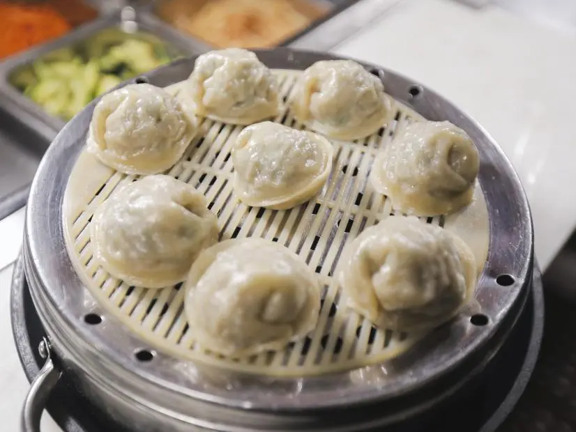 Seoul Street Style Dumplings as prepared by Chef/Owner Peter Jeon at Del Seoul in Chicago, Illinois as seen on Food Network's Triple D Nation, season 8.