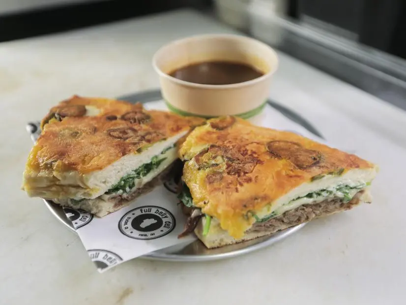 Orange Chicken Sando as prepared by Chef/Owner Tom Marrin at Full Belly Deli in Reno, Nevada, as seen on Food Network's Triple D Nation, season 8.