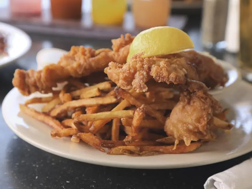 Fish and Chips as prepared by Chef/Owner Rusty Winkstern at Monument Cafe in Austin, Texas, as seen on Food Network's Triple D Nation, season 8.