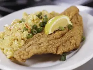 Voodoo Catfish with Mac and Cheese as prepared by Chef/Owner Tommy Spain at Joey K's  Restaurant and Bar in New Orleans, Louisiana, as seen on Food Network's Triple D Nation, season 8.